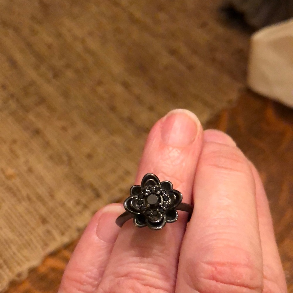 NOT FOR SALE Black jewel flower ring.